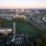 drone-view-of-a-city-skyline-with-buildings-near-t-2023-11-27-05-02-01-utc-scaled.webp